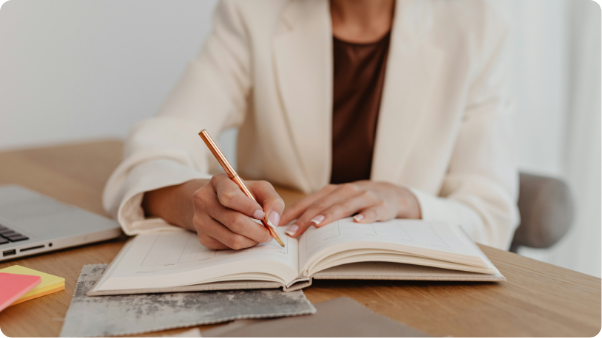 A hand checking items off a printed checklist